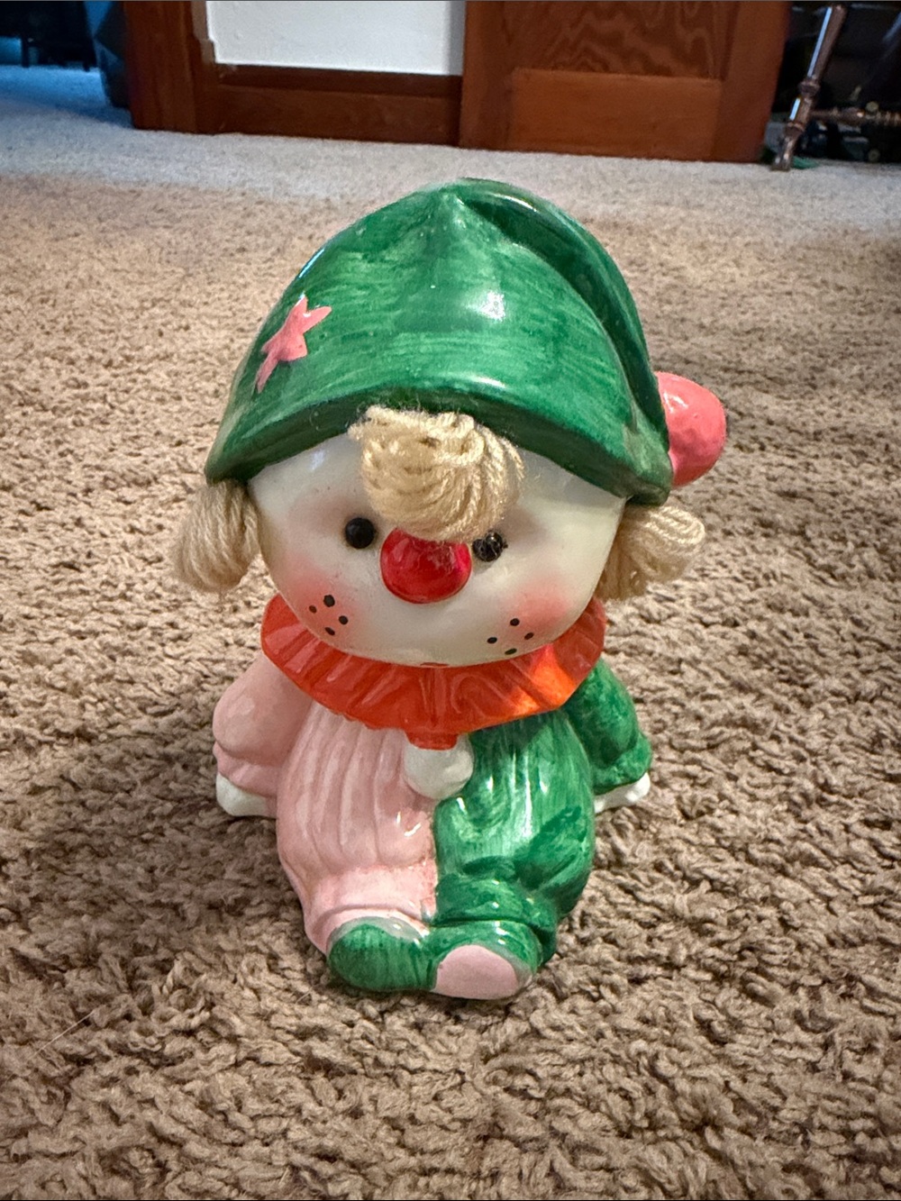 Antique Ceramic Clown Figurine in Green and Pink piggy bank.